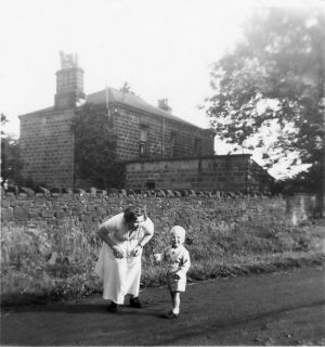Dorothy Bitton With Son Mike With The Farm Residence Behind, Circa 1954